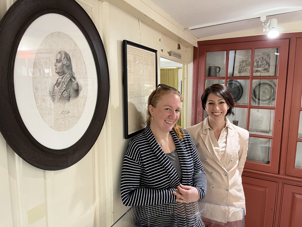 Aim Curator with AIM Executive Director with artifact.